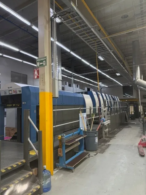 Inside a GMS Industries American manufacturing plant — a modern sheetfed press on the production floor